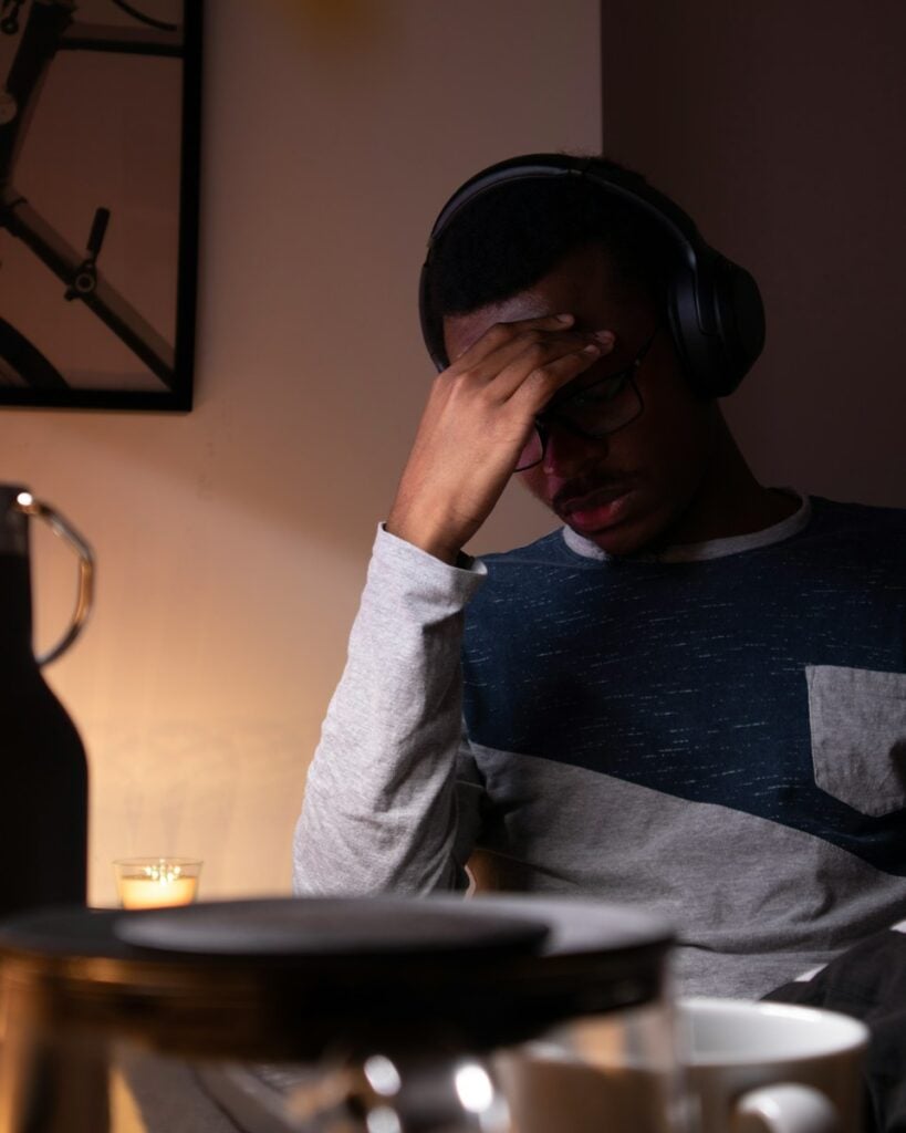 Man frustrated in front of his computer