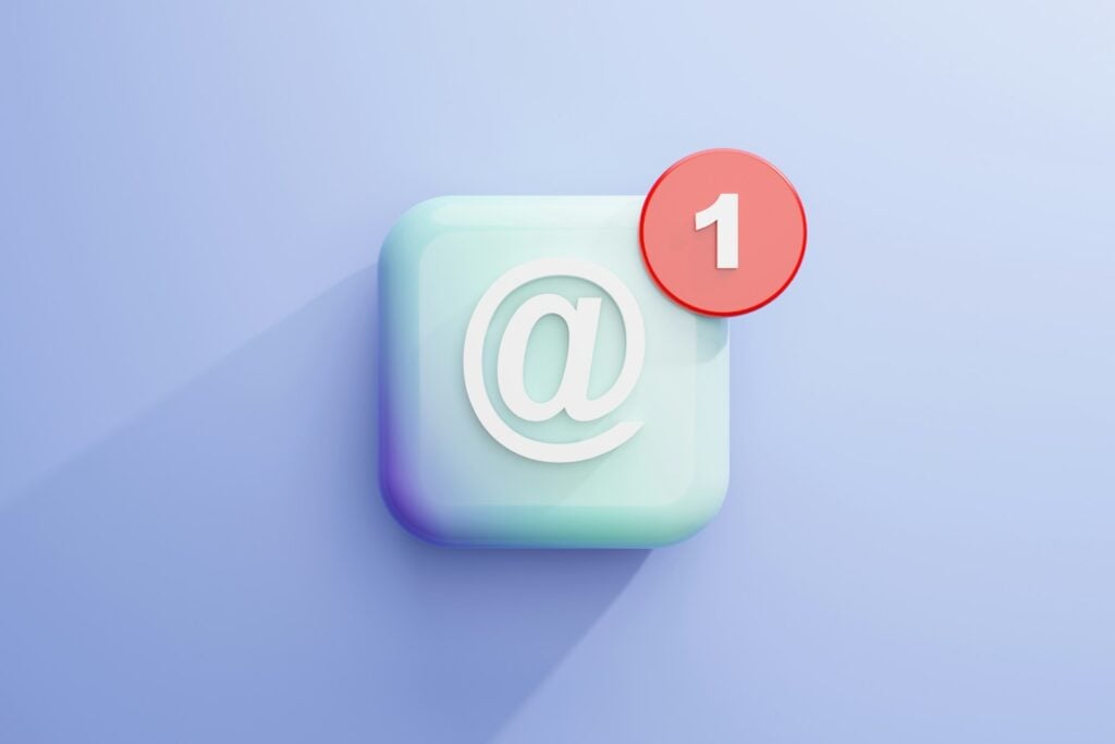 a light blue square with an @ symbol with a red circle on top of it with the number 1