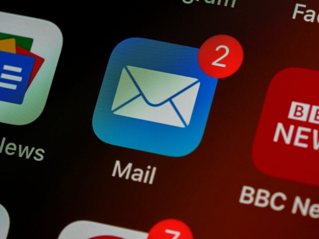 Mail app logo on a smart phone with 2 unread emails